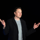 Elon Musk gestures as he speaks during a press conference at SpaceX’s Starbase facility near Boca Chica Village in South Texas on February 10, 2022.